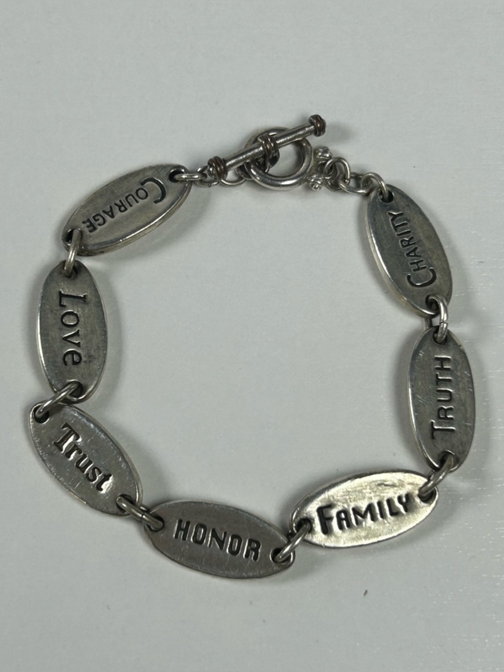Costume Fashion Virtues Charms Tennis Bracelet W /Toggle Clasp 8” Silvertone